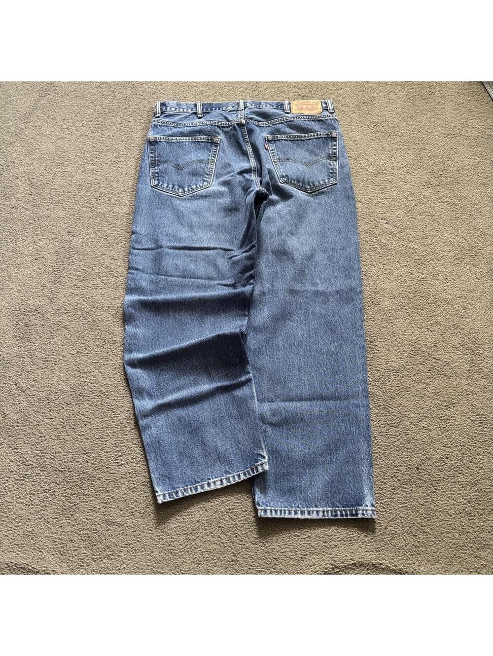 Vintage Y2K Heavyweight Faded Levi’s 550 Relaxed fitting jeans